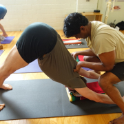 Adho-Mukha-Svanasana-adjusting-1