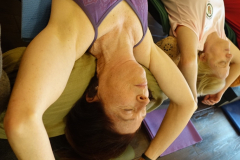 Chair-Dvi-Pada-Viparita-Dandasana-woman